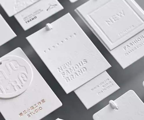 White Card Paper Hangtag New Design Custom Offset Printing Die Cut Logo Hang Tags for Clothing